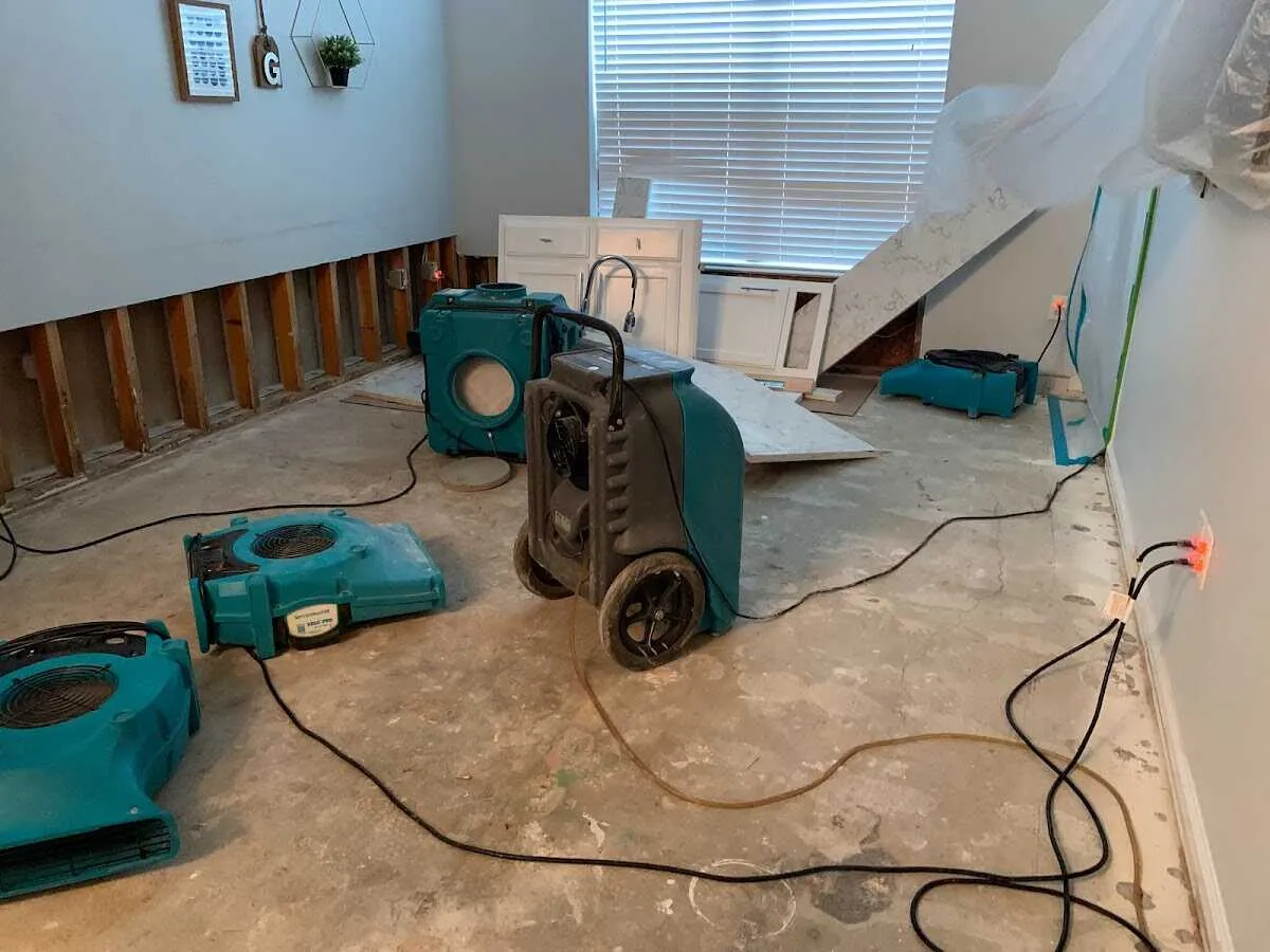 Dehumidifier in flood-cut room for Water Damage Restoration in Daphne